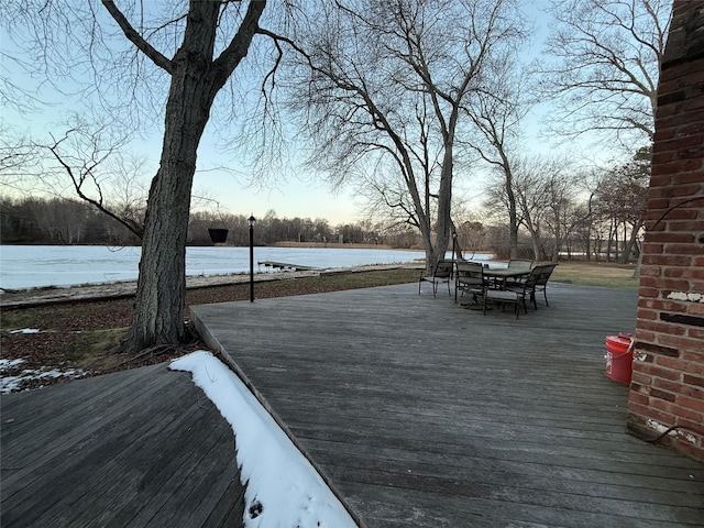 wooden terrace with a water view