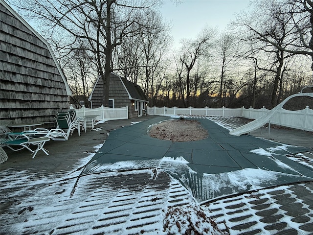 view of snow covered pool