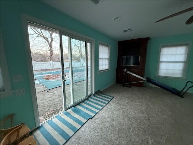 entryway featuring carpet flooring