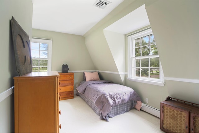 1 Lake Dr, Middle Island, NY 11953 - carpeted bedroom featuring a baseboard radiator
