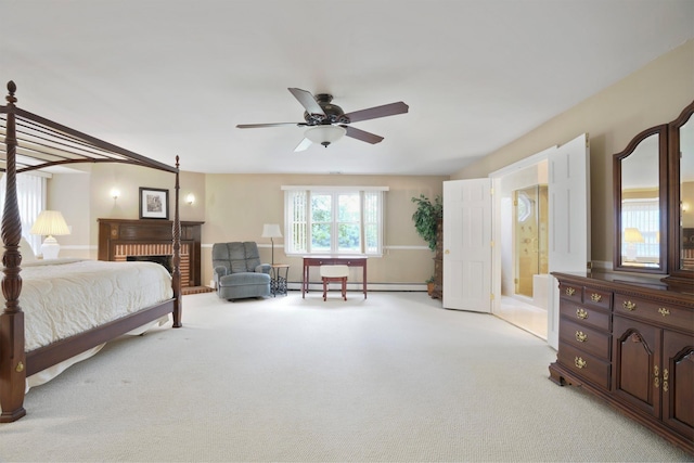 1 Lake Dr, Middle Island, NY 11953 - bedroom featuring baseboard heating, light colored carpet, and a ceiling fan