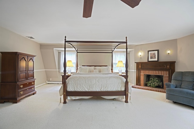 1 Lake Dr, Middle Island, NY 11953 - bedroom with baseboard heating, light carpet, multiple windows, and a fireplace