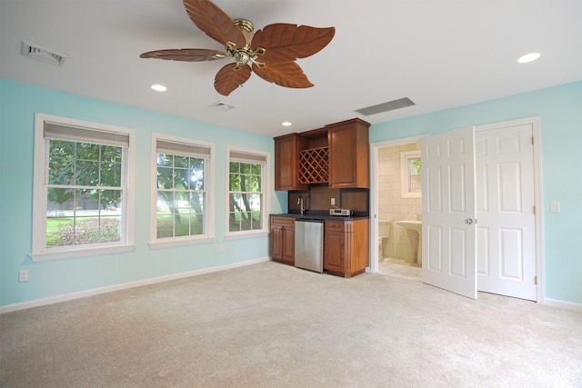 1 Lake Dr, Middle Island, NY 11953 - kitchen featuring stainless steel dishwasher, light carpet, dark countertops, a ceiling fan, and recessed lighting