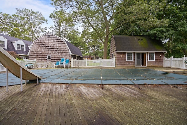 1 Lake Dr, Middle Island, NY 11953 - view of swimming pool with a wooden deck and an outdoor structure