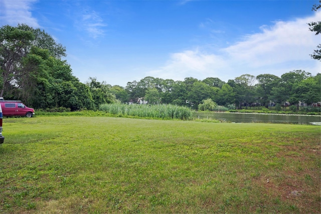 1 Lake Dr, Middle Island, NY 11953 - view of grassy yard with a water view