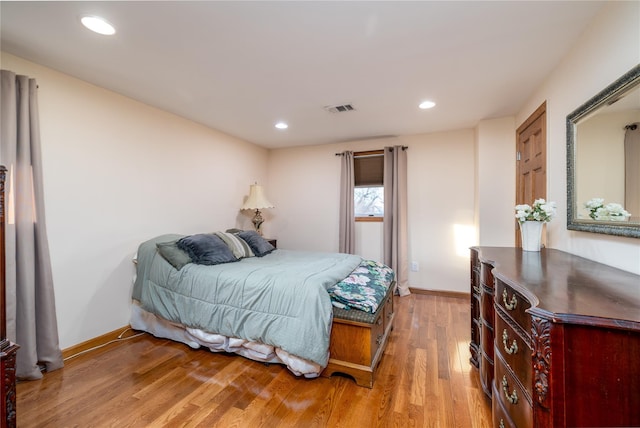 bedroom featuring light wood-type flooring