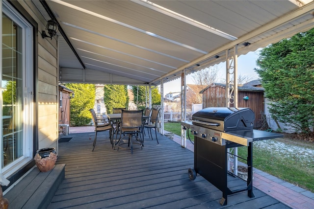 wooden terrace with grilling area