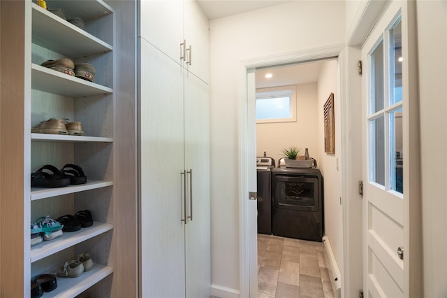 bathroom featuring washer and dryer