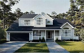 view of front of home with covered porch and a front lawn