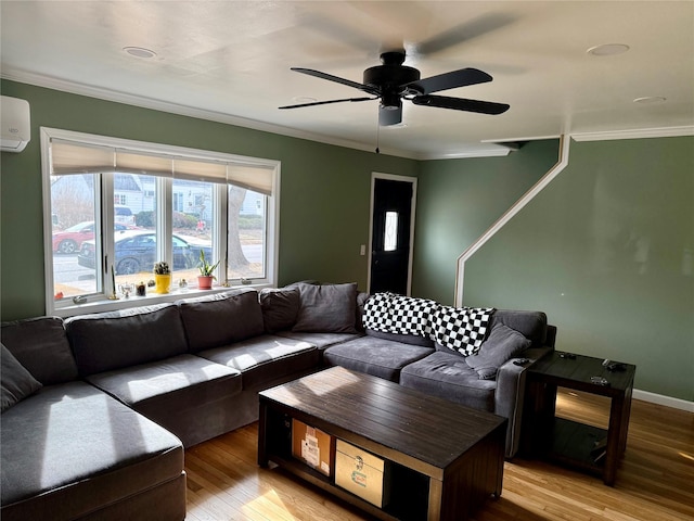 living room featuring crown molding, ceiling fan, an AC wall unit, and hardwood / wood-style flooring