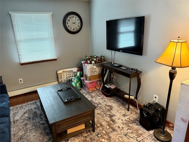 living room featuring baseboard heating