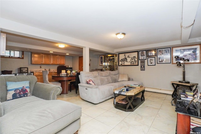 living room with a baseboard heating unit