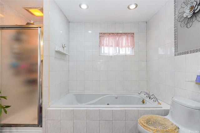 bathroom with toilet, separate shower and tub, and tile walls