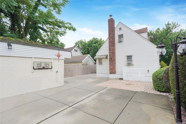 view of property exterior featuring a patio