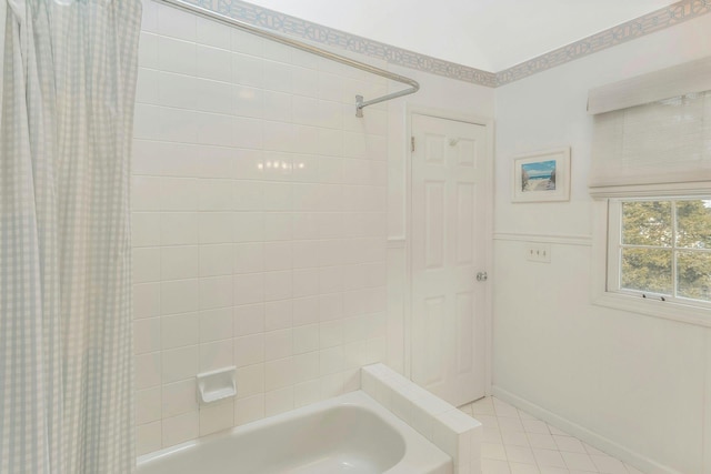 bathroom with shower / bathtub combination with curtain