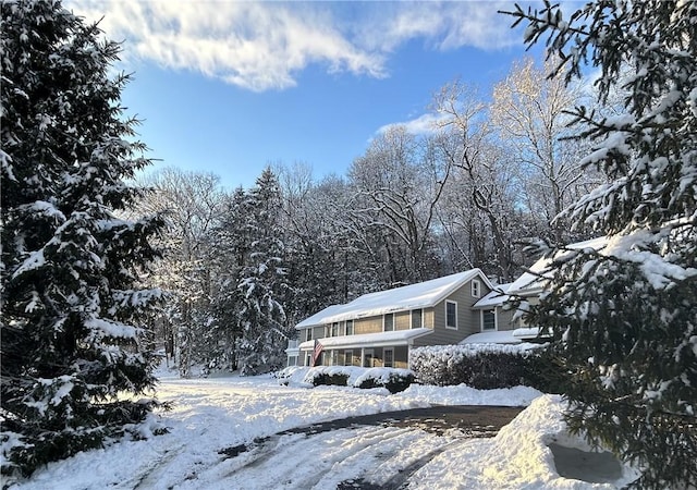 view of snow covered property