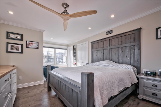 bedroom with ornamental molding, dark wood-type flooring, and ceiling fan