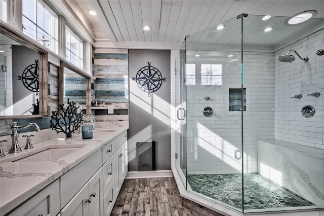 bathroom featuring vanity, wood-type flooring, wood ceiling, and a shower with shower door