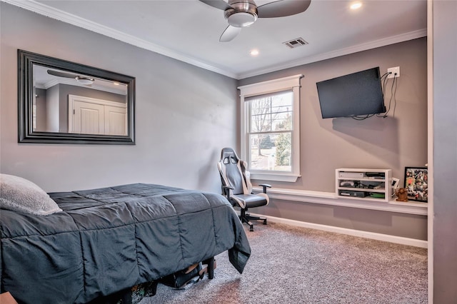 carpeted bedroom with crown molding and ceiling fan