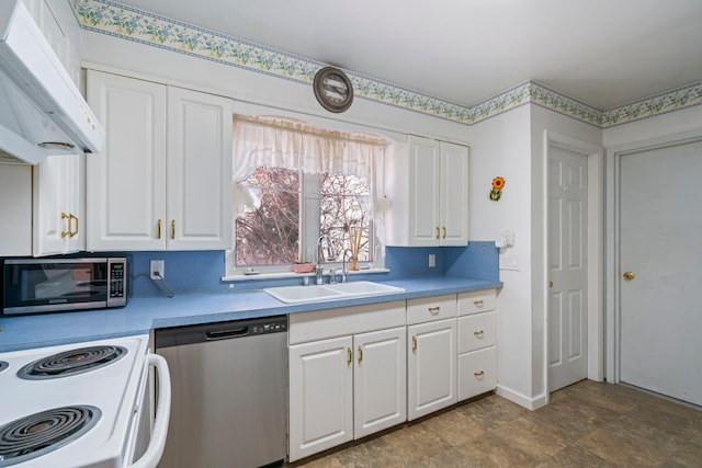 kitchen with stainless steel appliances, sink, custom exhaust hood, and white cabinets