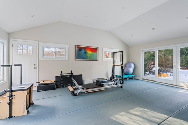 exercise area featuring vaulted ceiling