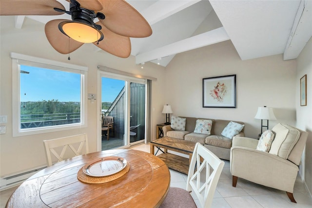 tiled living room featuring vaulted ceiling with beams, rail lighting, ceiling fan, and baseboard heating