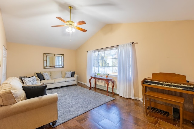 living room with a ceiling fan, baseboard heating, vaulted ceiling, and baseboards