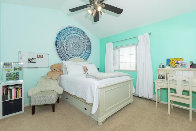 carpeted bedroom featuring vaulted ceiling and ceiling fan