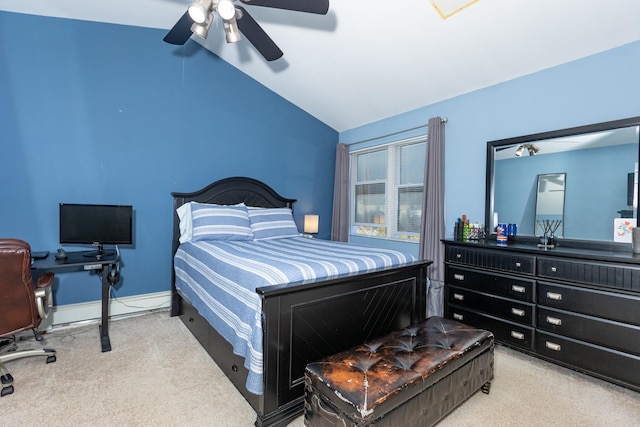 carpeted bedroom with a baseboard radiator, vaulted ceiling, baseboards, and ceiling fan