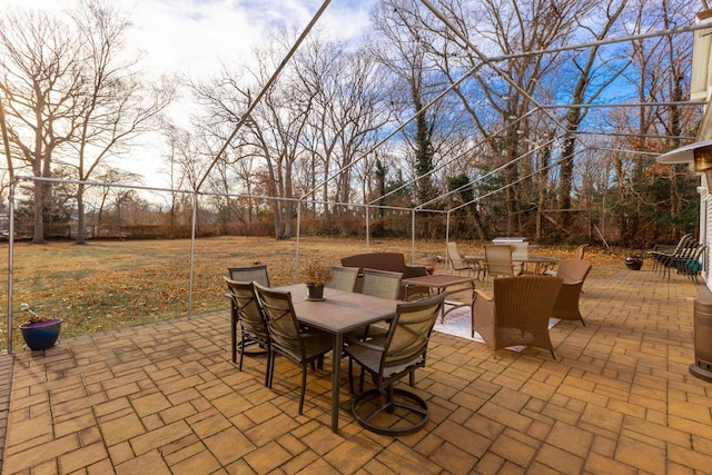 view of patio / terrace featuring outdoor dining space and fence