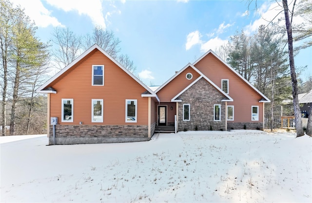 view of snow covered house