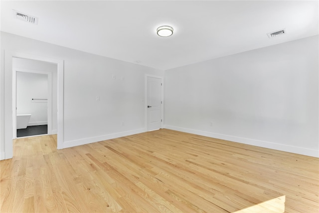 empty room featuring light hardwood / wood-style floors