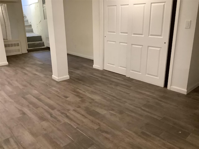 interior space with dark hardwood / wood-style floors