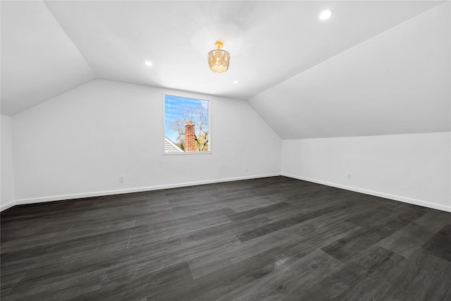 33 Potter Ln, Huntington, NY 11743 - bonus room with lofted ceiling, baseboards, recessed lighting, and dark wood-style flooring