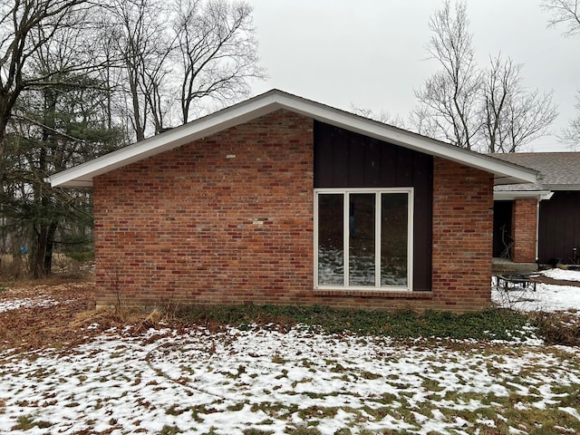 view of snow covered property