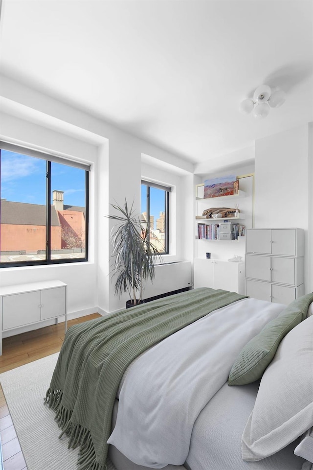 bedroom featuring light hardwood / wood-style floors