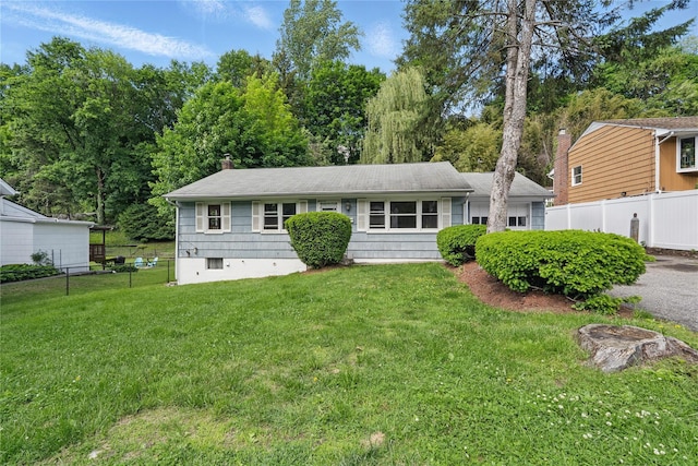49 Pine Ave, Ossining, NY 10562 - back of property featuring a garage, a chimney, and a shingled roof
