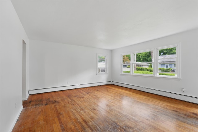 49 Pine Ave, Ossining, NY 10562 - empty room with wood finished floors and cooling unit
