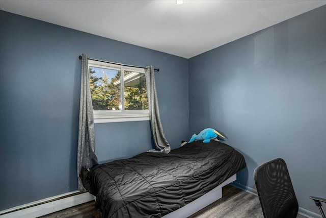 bedroom featuring dark wood-type flooring