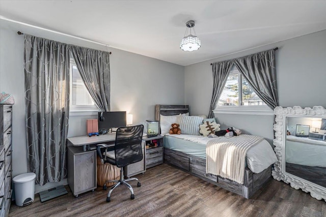 bedroom with wood-type flooring