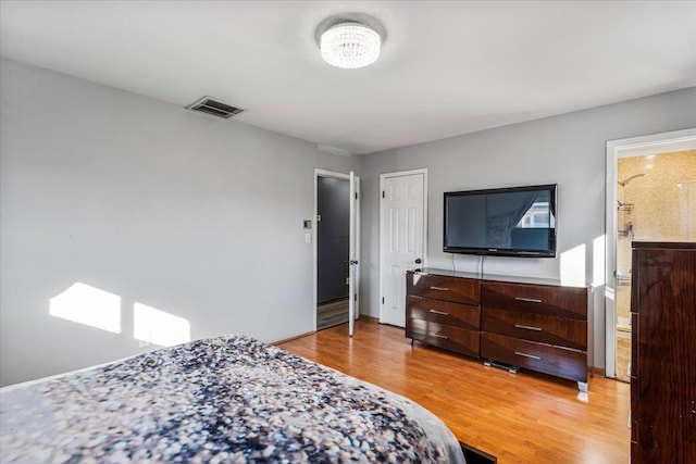 bedroom featuring hardwood / wood-style flooring