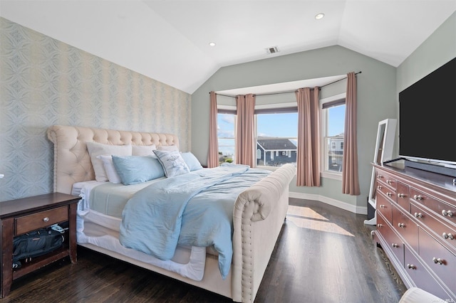 bedroom featuring vaulted ceiling and dark hardwood / wood-style floors