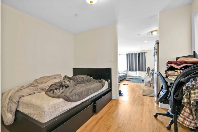 bedroom featuring light hardwood / wood-style floors