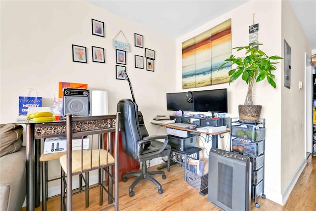 home office featuring light hardwood / wood-style flooring