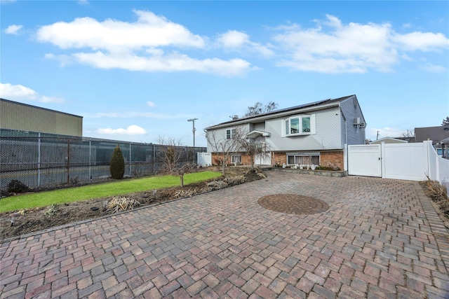 view of front of property featuring a patio area