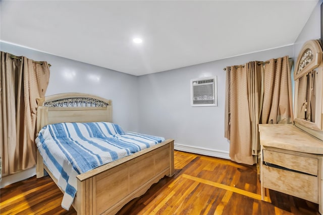 bedroom featuring dark wood-type flooring and a wall mounted AC