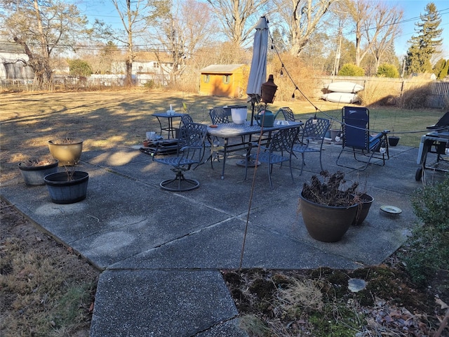 view of patio with an outdoor structure