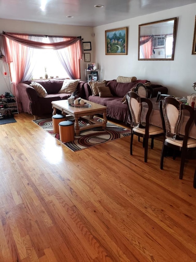 living room with light hardwood / wood-style floors