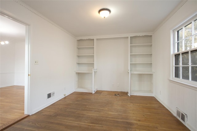 unfurnished bedroom with dark hardwood / wood-style floors