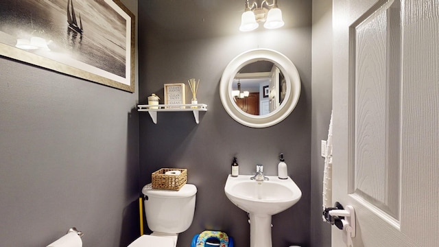 bathroom featuring toilet